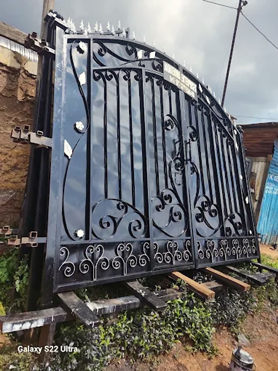 Arched Wrought Iron Gate with Scrollwork