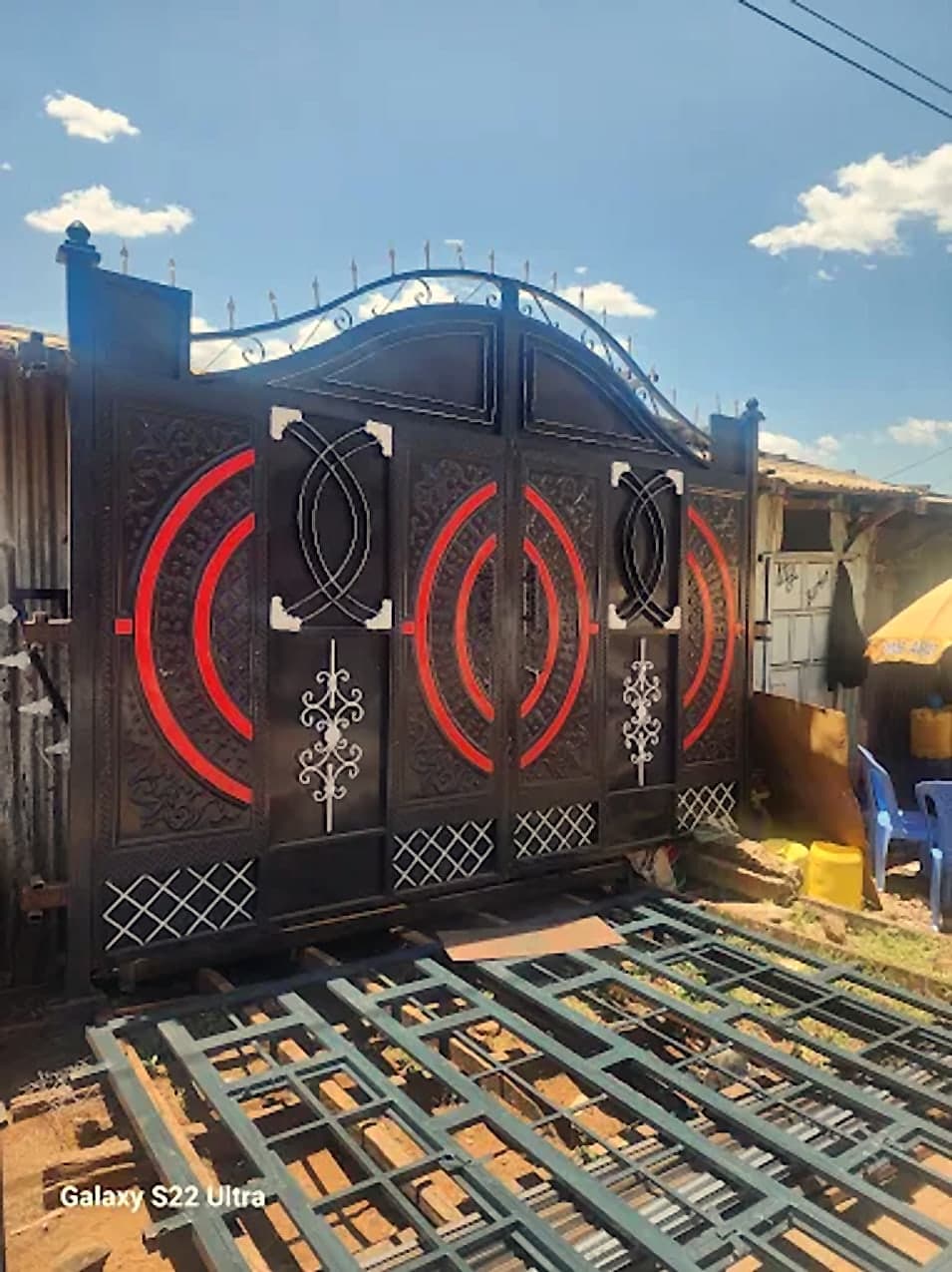 Black & Red Medallion Gate with Grill Panels