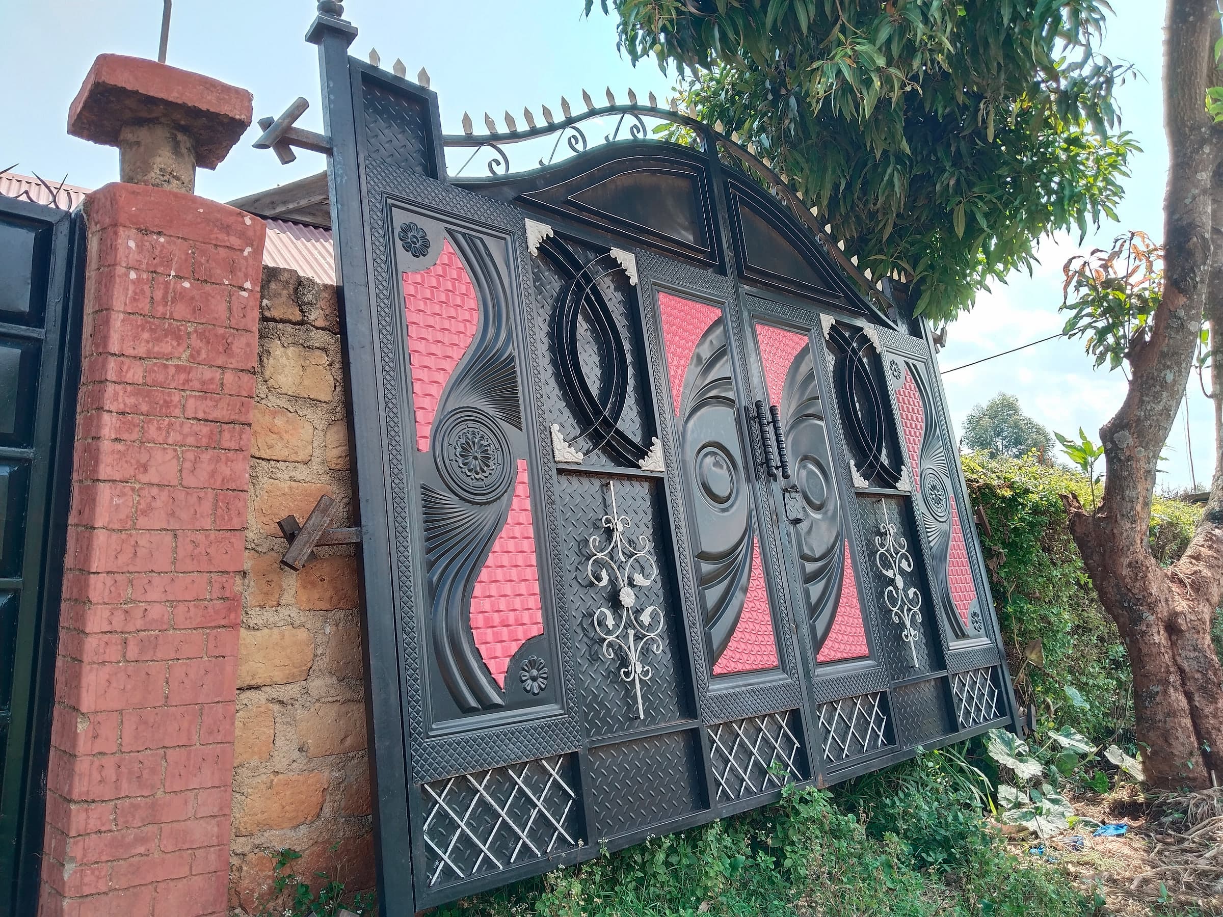 Black & Rose Gate on Brick Pillars
