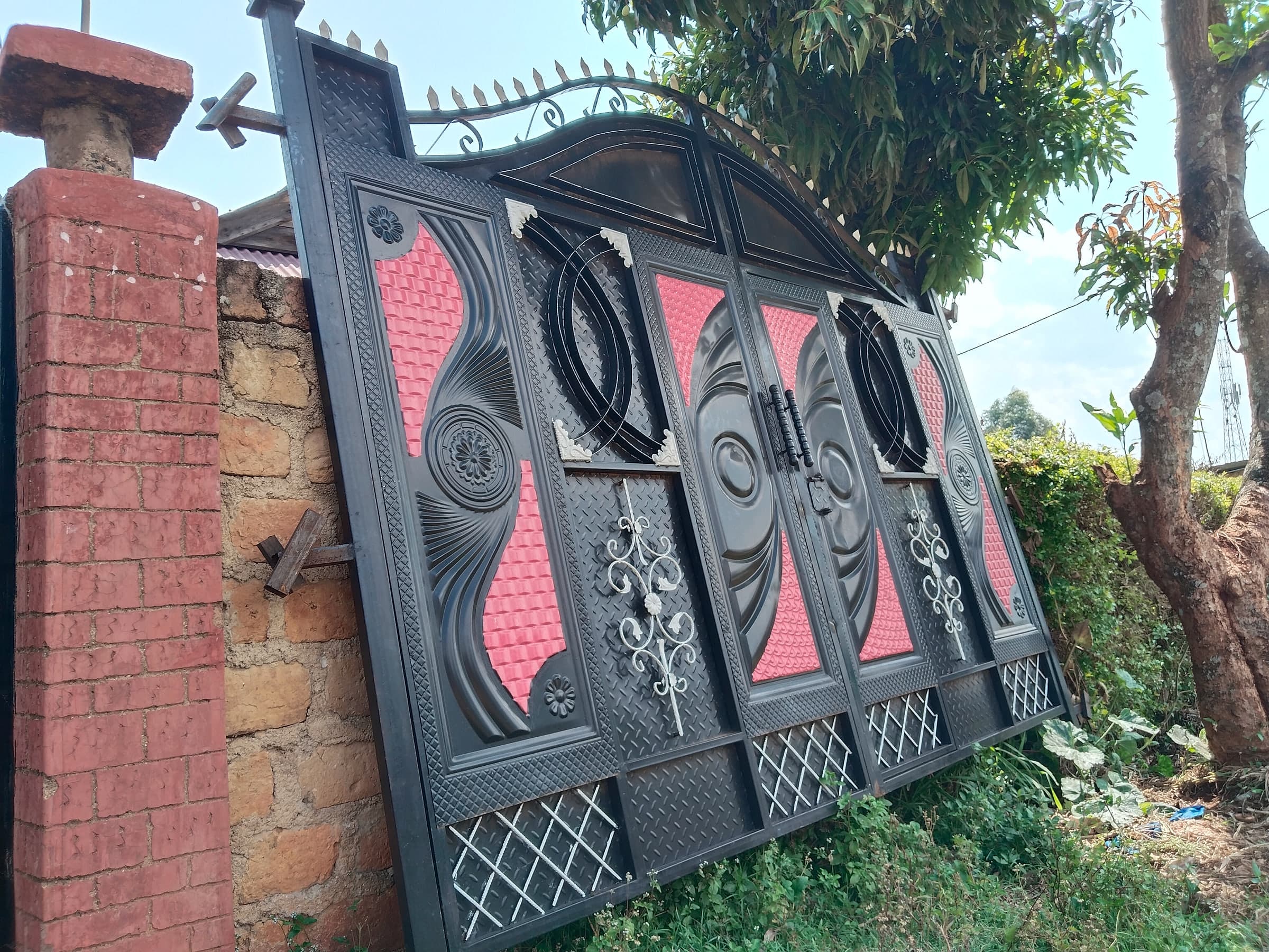 Black & Rose Gate on Brick Pillars