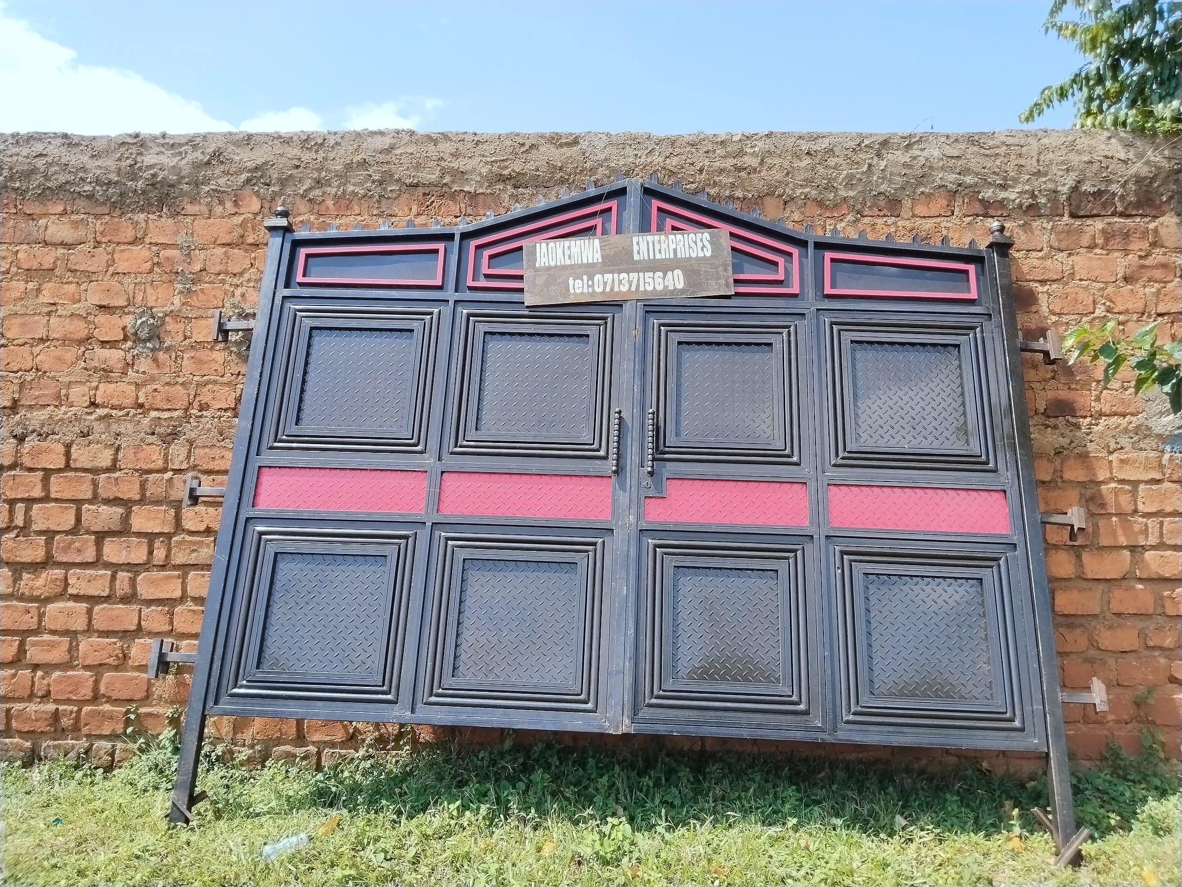 Black & Rose Panel Gate on Brick Wall