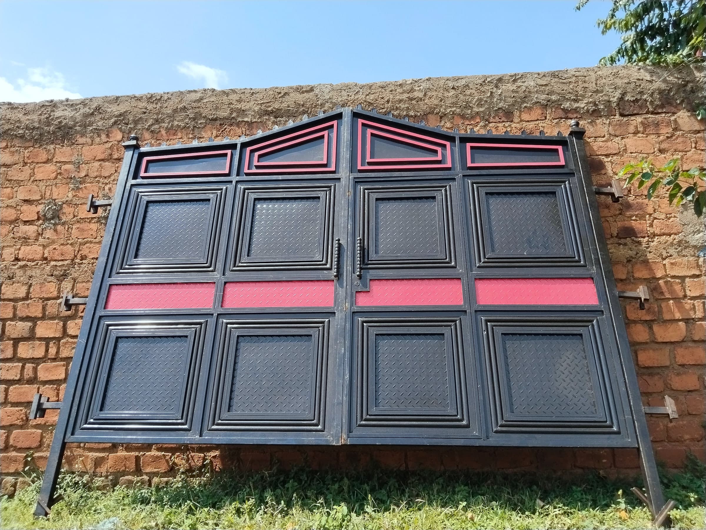 Black & Rose Panel Gate on Brick Wall
