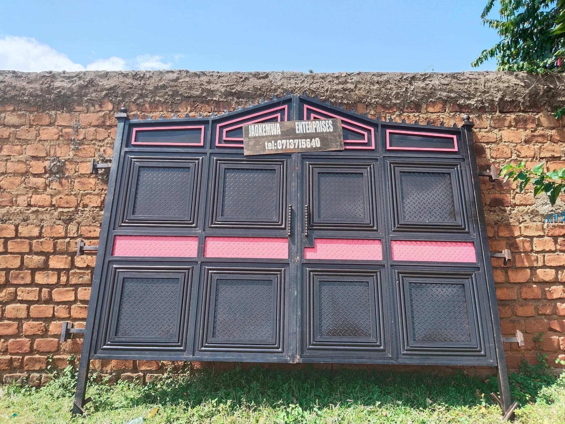 Black & Rose Panel Gate on Brick Wall