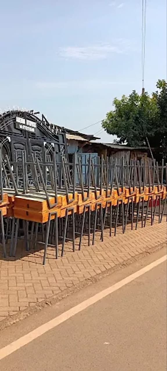 Desks Stacked for Collection