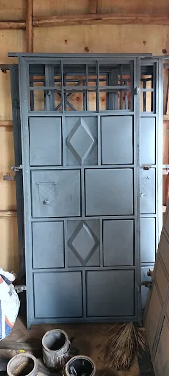 Grey Diamond-Panel Door with Grill Fanlight